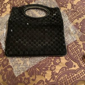 St. John logo clutch